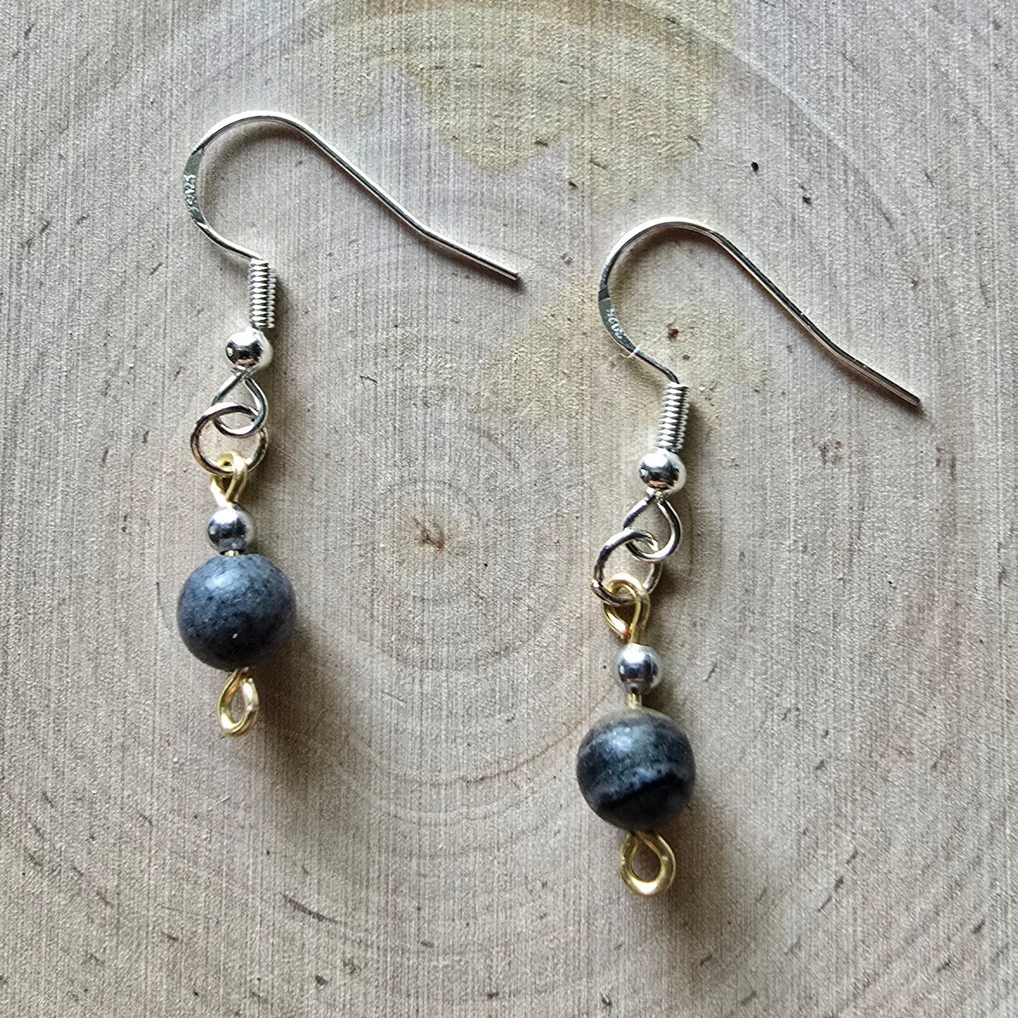 Black network and silver dangle earrings
