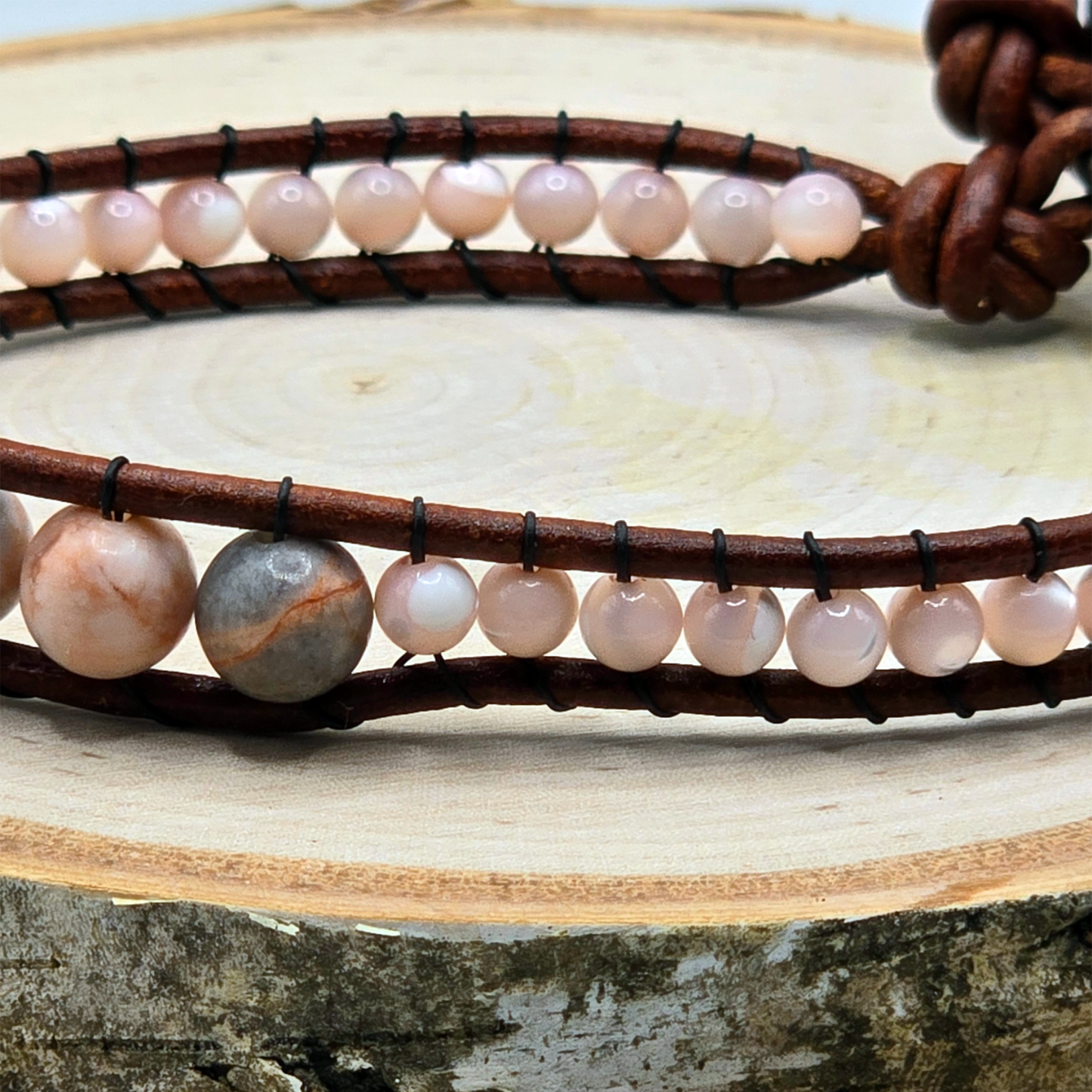 Zebra jasper and mother of pearl graduated single wrap leather bracelet