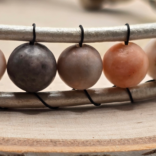Zebra stone and silvertone leather single wrap bracelet