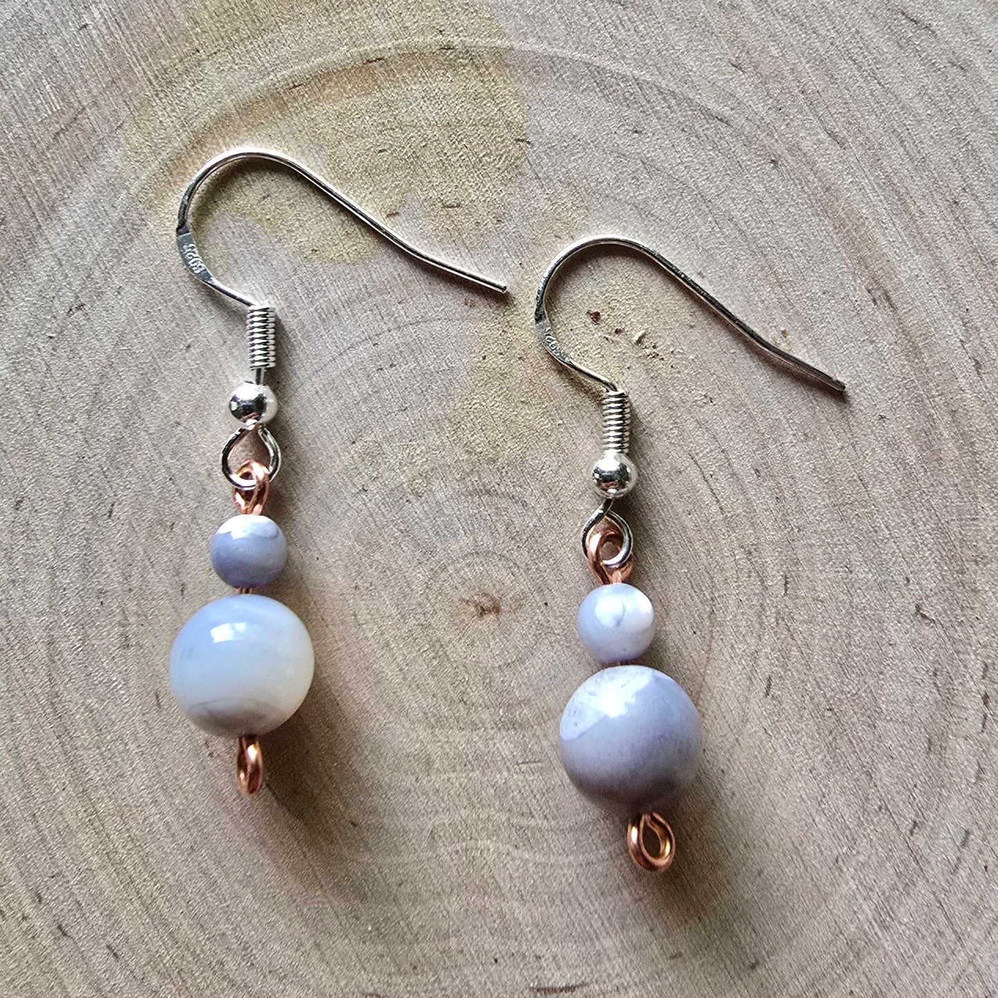 Mother of pearl graduated dangle earrings