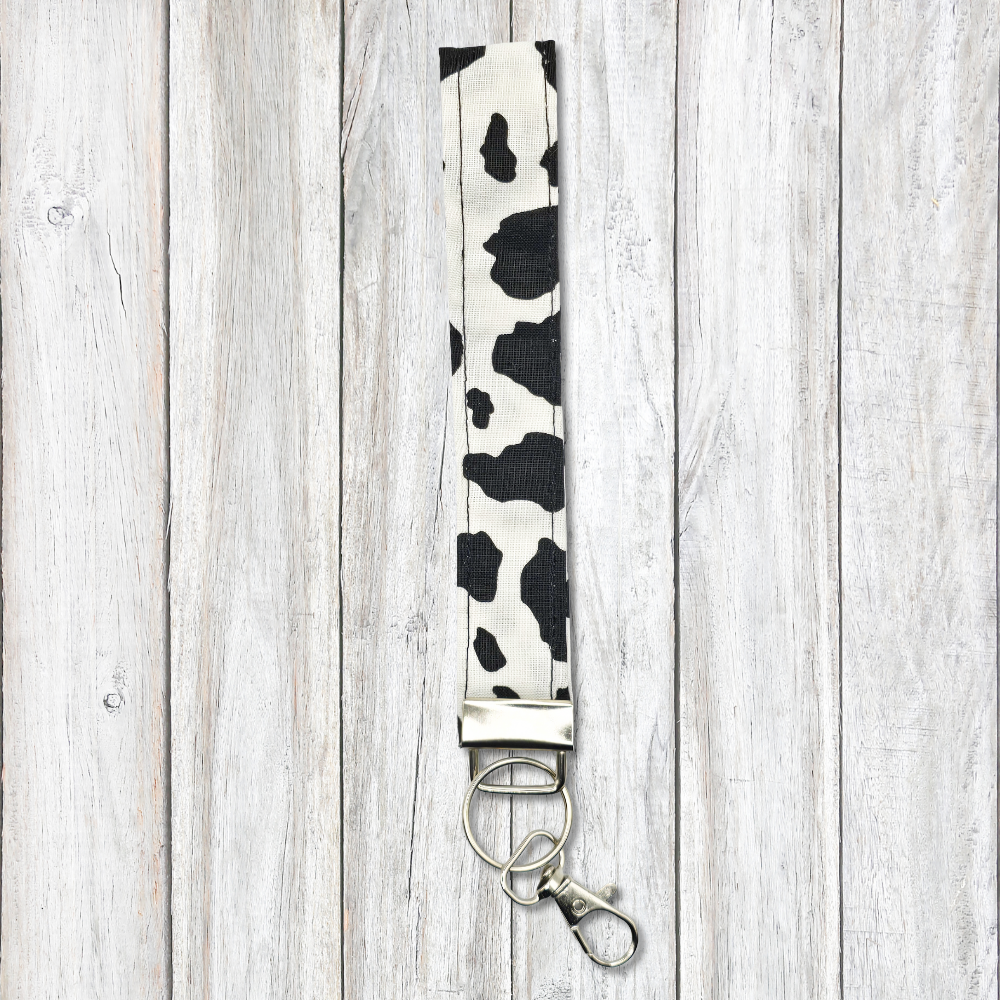 Black and white cow print keyfob wristlet