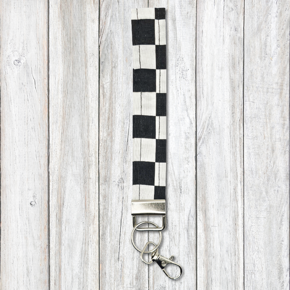 Black and white checkerboard keyfob wristlet