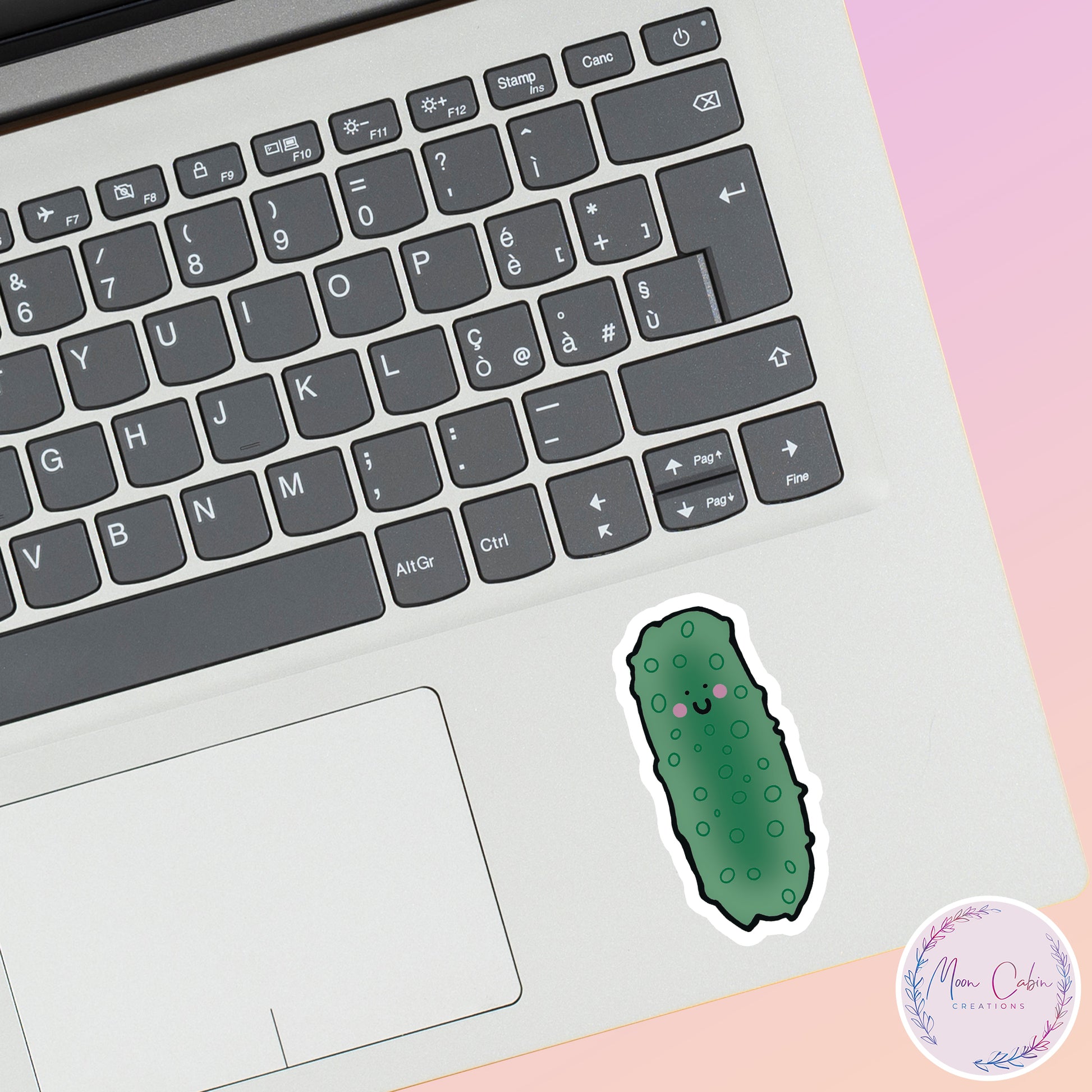 Big dill pickle vinyl sticker, on laptop