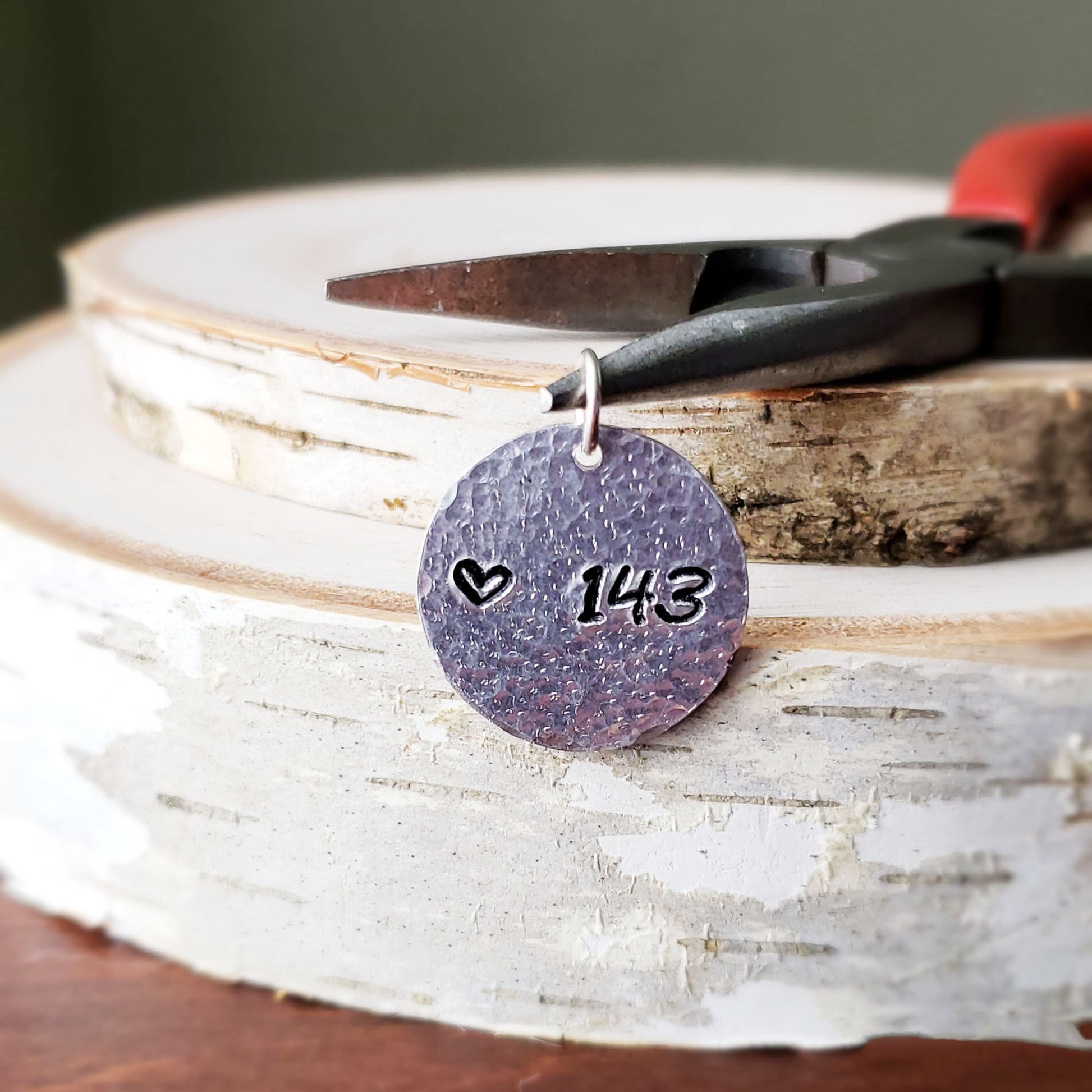 Hand-stamped "143" round aluminum pendant