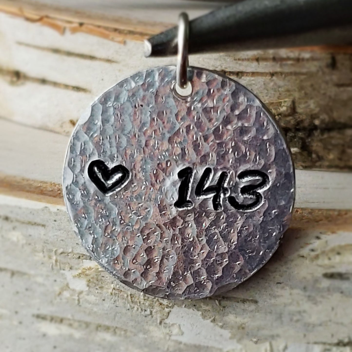 Hand-stamped "143" round aluminum pendant