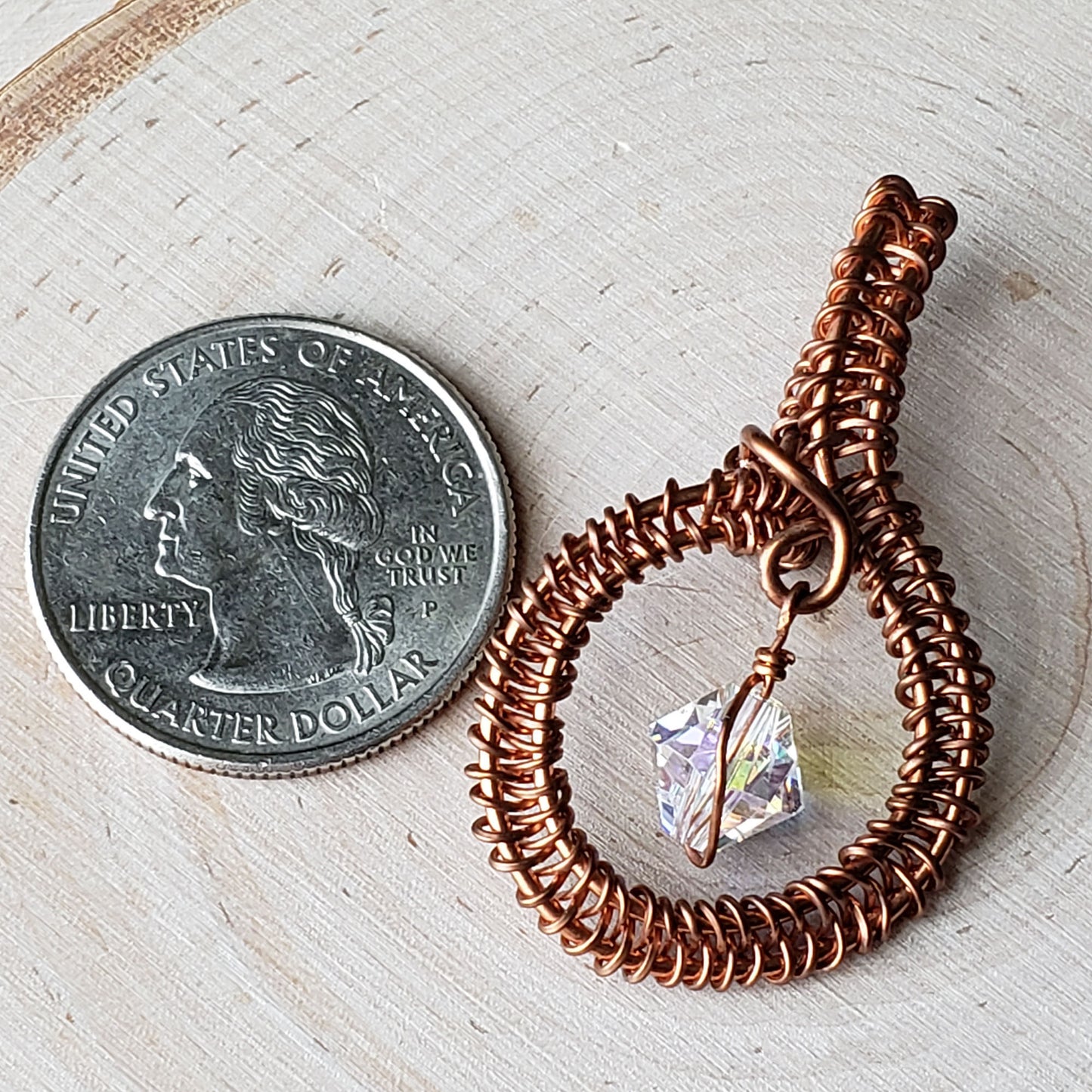 Round copper pendant with clear Swarovski crystal accent bead