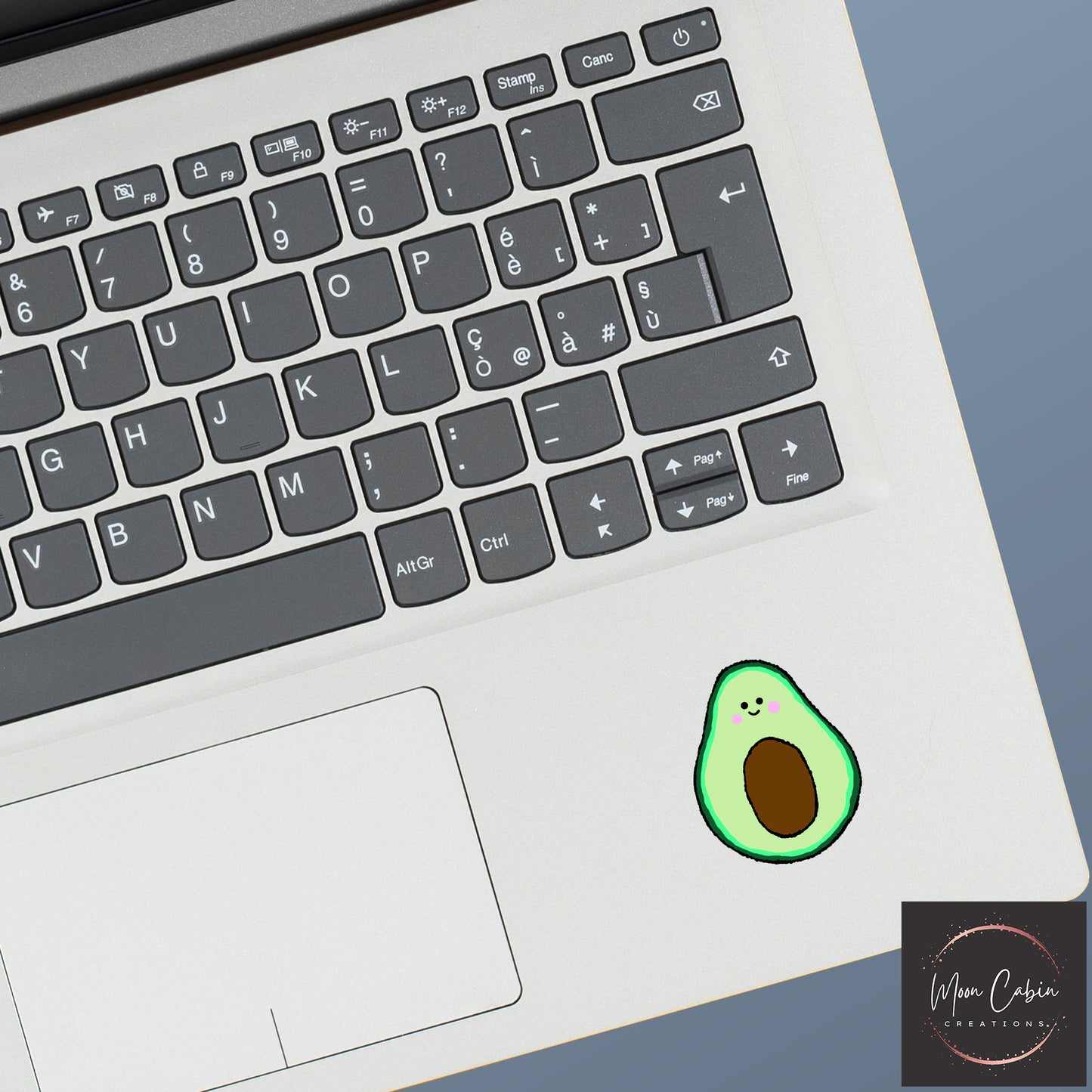 Happy avocado hand drawn vinyl sticker, on laptop